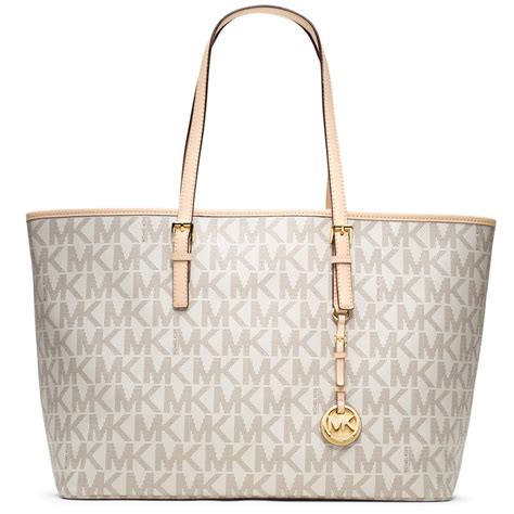 michael kors monogram medium jet set tote|michael kors carryall pale peanut.